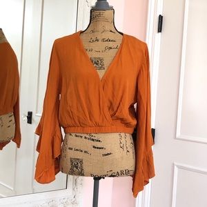 Ruffle Sleeve Wrap Top